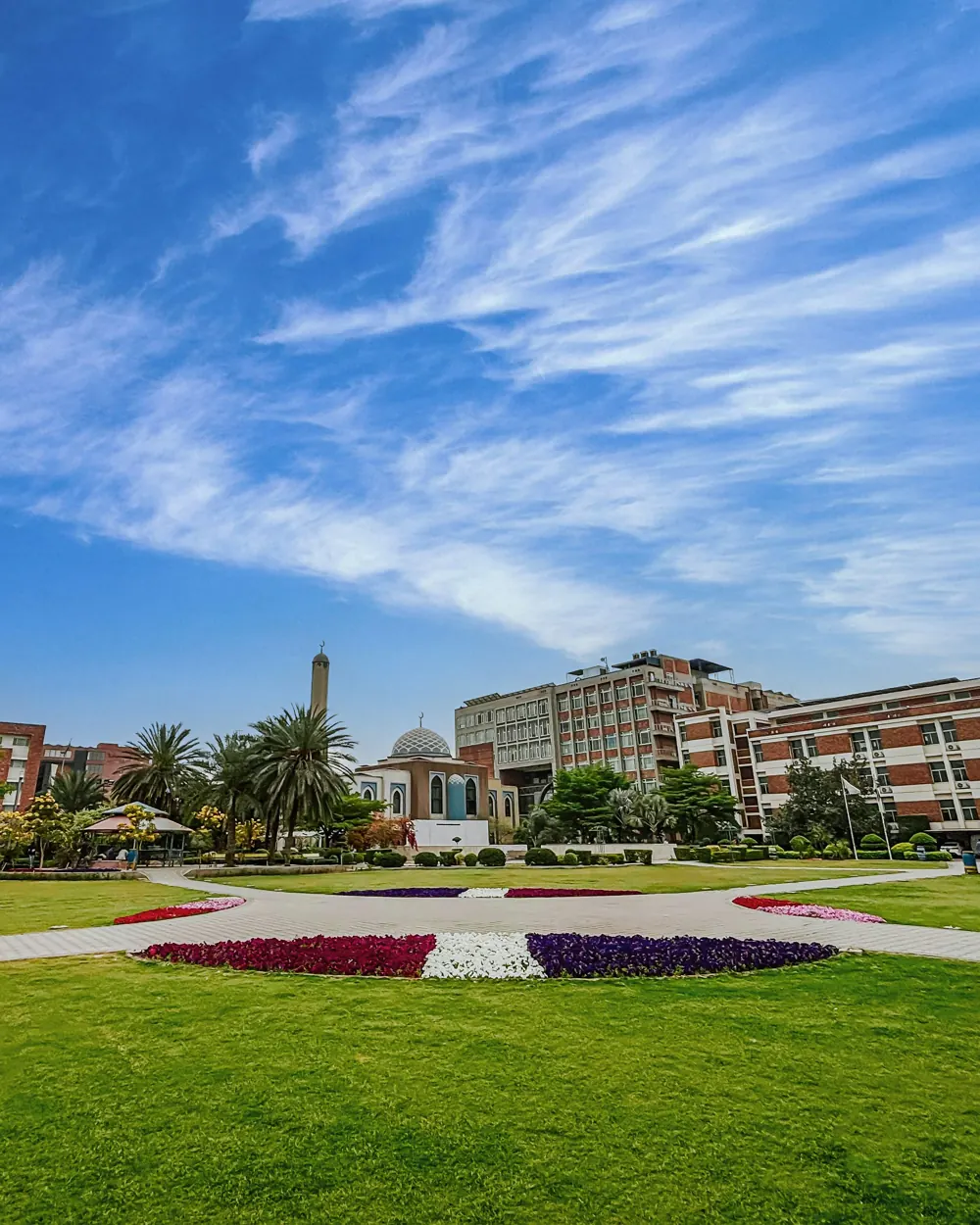 University of Lahore campus with gardens and academic buildings